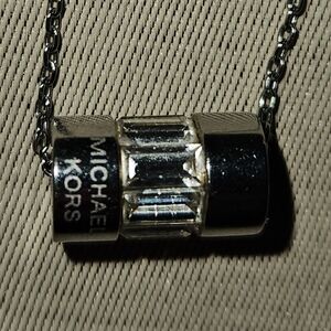 Michael Kors Silver Tone Crystal Baguette Pendant Necklace